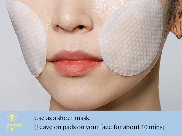 A woman with Avarelle Total Calming Toner Pads applied to her cheeks, accompanied by a text that says: "Beauty tips: use as a sheet mask. Leave on pads on your face.